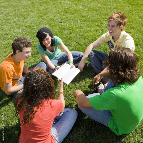 Five teens with bible