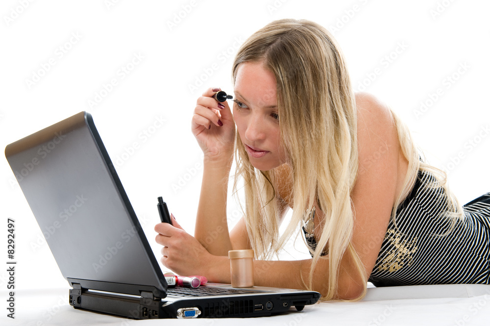 Beautiful girl with blonde hair funny using of laptop. Beautiful girl with blonde hair funny using of laptop.