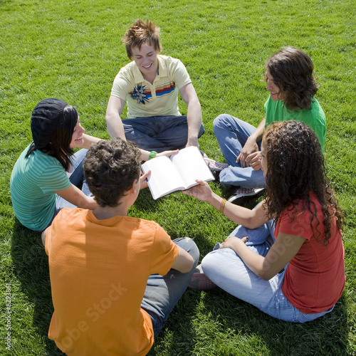 Five teens with bible
