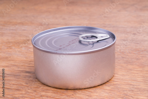 Closed Food Can on a Wooden Table