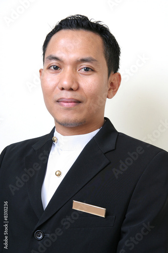 man in hotel or restaurant uniform