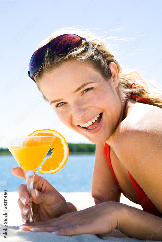 © pressmaster - Woman with cocktail