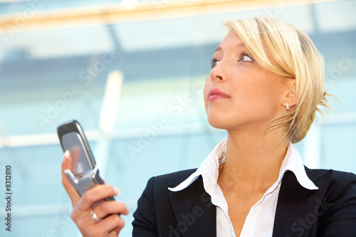 Free Download Businesswoman with mobile phone - GFXLoad