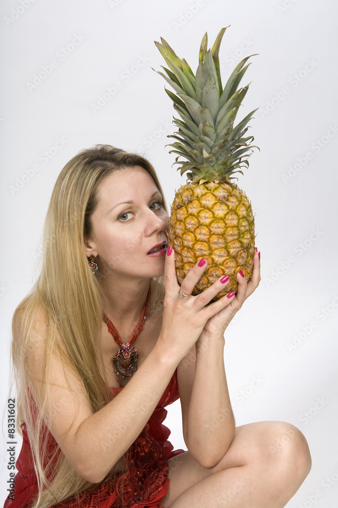 Blonde woman with pineapple Blonde woman with pineapple