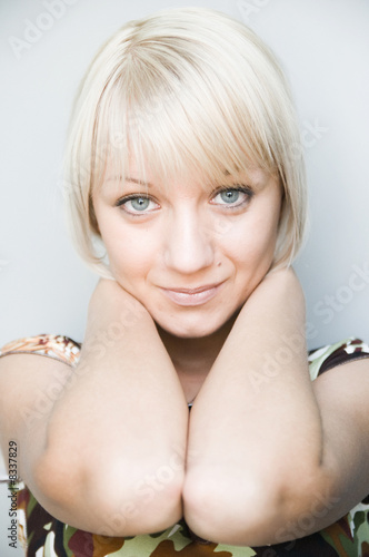 Portrait of the young beautiful girl with light hair