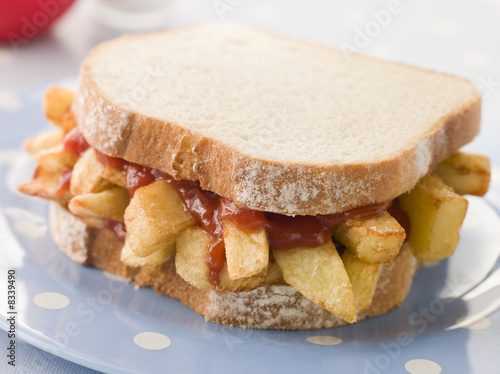 Chip Sandwich on White Bread with Tomato Ketchup