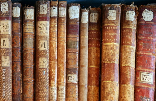 Row of old  books cover spines