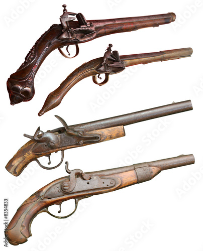 Isolated vintage firearm pistols of XIVII-XIX centuries