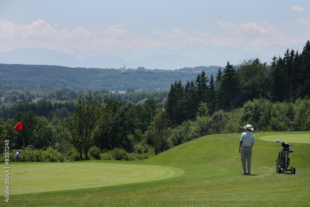 Golfspieler am Grün