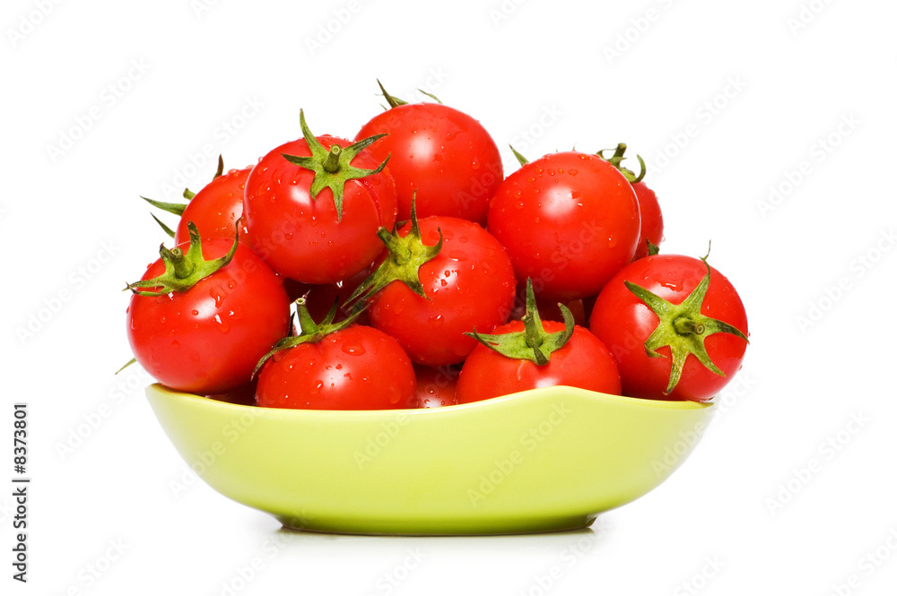 Wet whole tomatos arranged isolated on white Wet whole tomatos arranged isolated on white