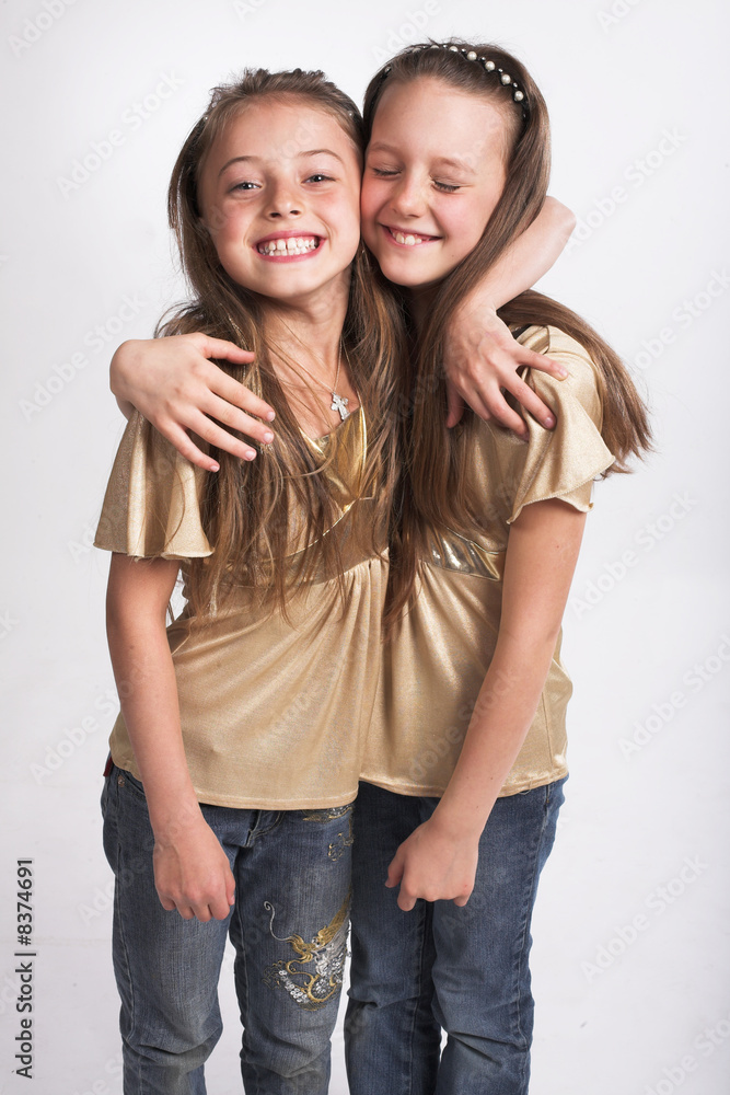Two little girls hugging each other Two little girls hugging each other