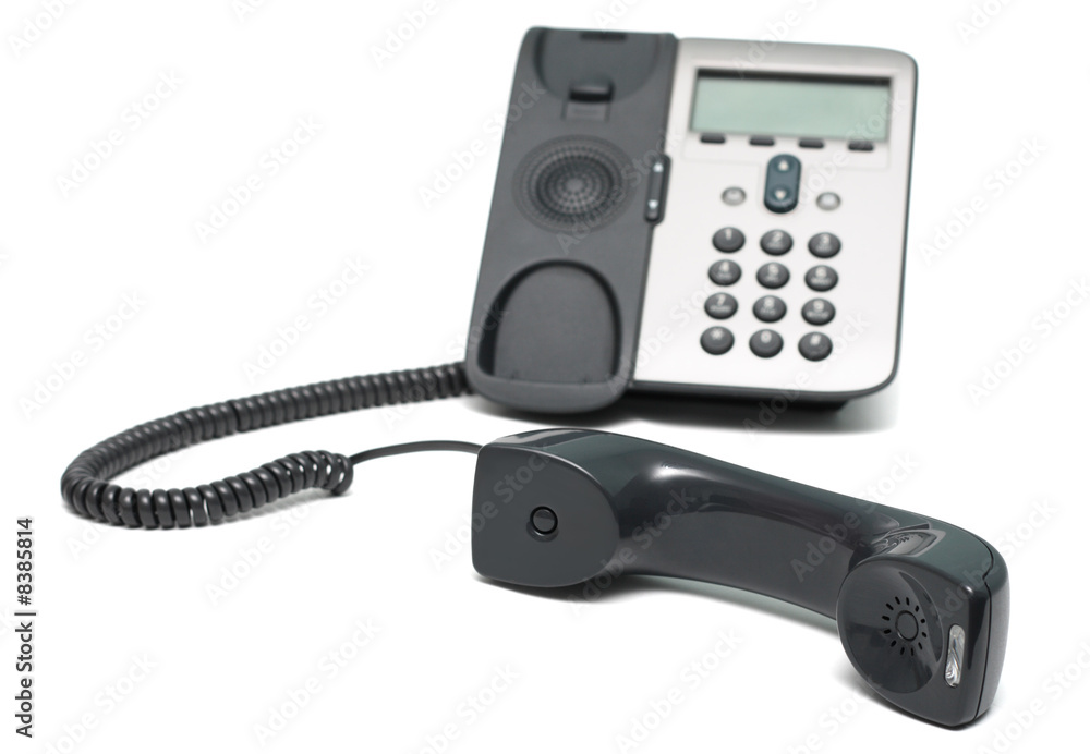 IP Phone isolated on white background, focus on the receiver IP Phone isolated on white background, focus on the receiver
