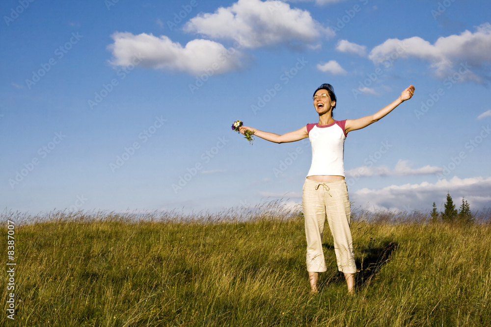 Young woman enjoying summer field Young woman enjoying summer field