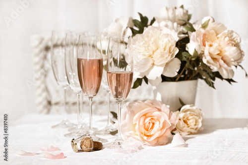 Two glasses filled with pink Champagne