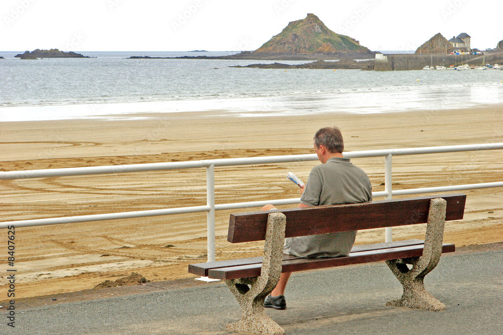 reading man at the beach