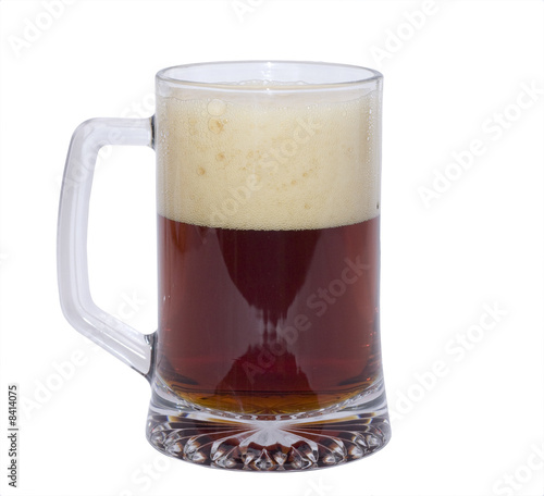 Cold dark beer glass isolated on white background