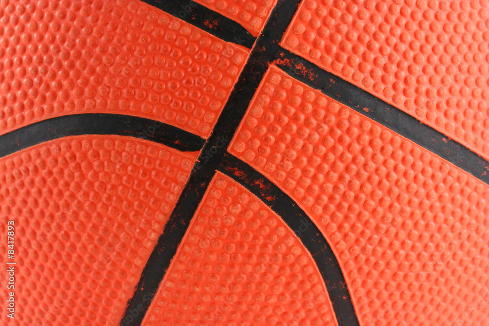 Fototapeta premium Orange rubber basketball macro background