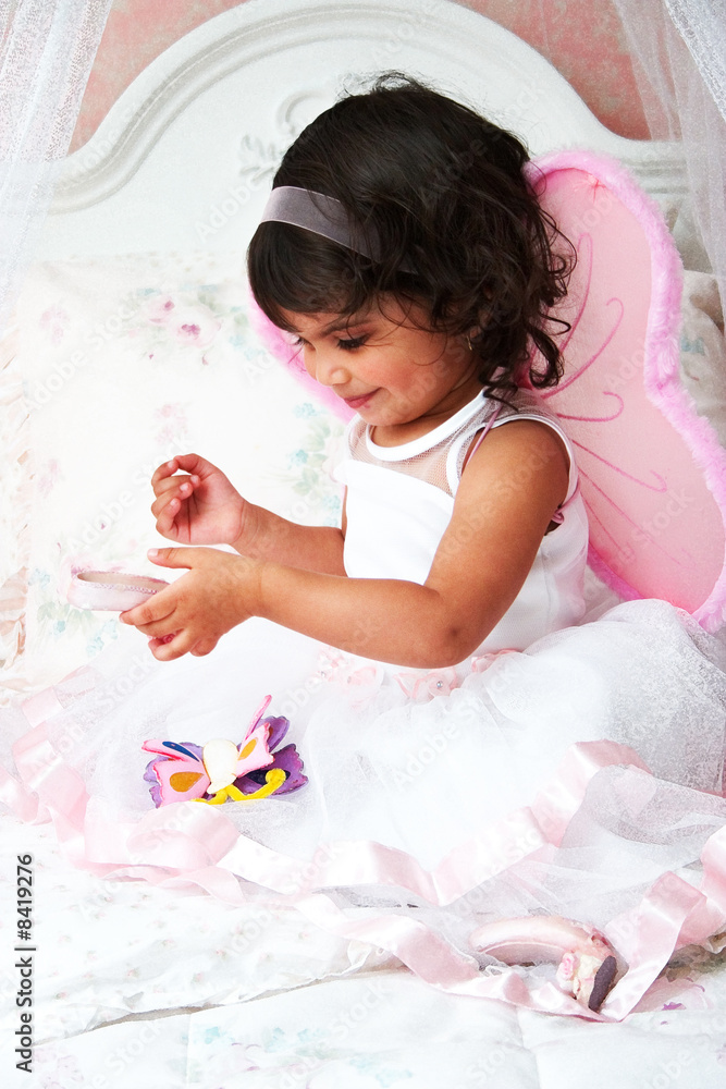 Girl Playing in Bedroom Wearing Butterfly Costume Girl Playing in Bedroom Wearing Butterfly Costume