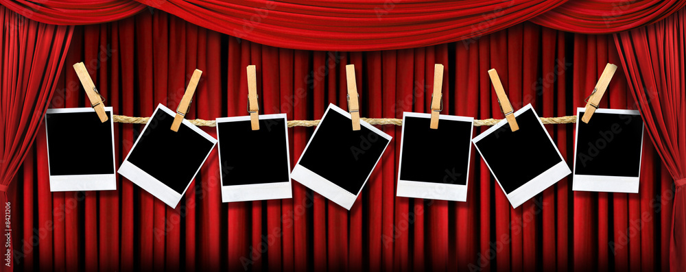 Fototapeta premium Red Theater Drapes and Polaroids With Dramatic Light and Shadows