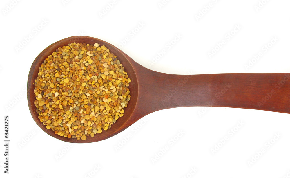 Pollen grains in wooden spoon Pollen grains in wooden spoon