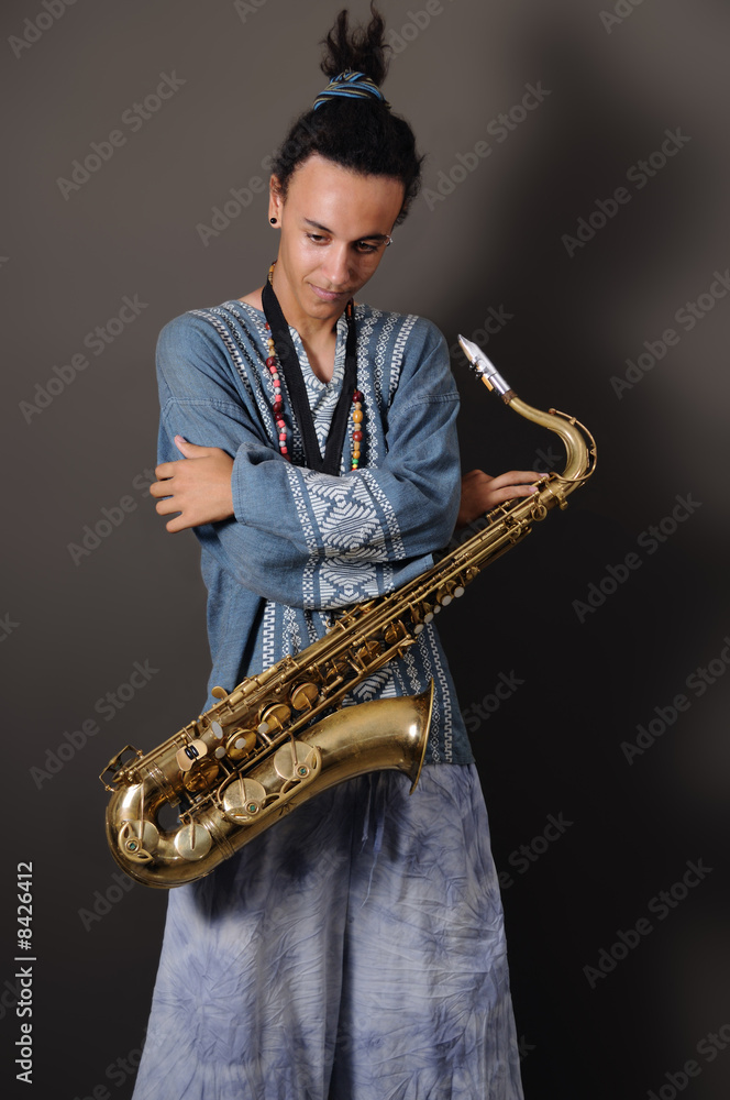 Naklejka premium Teen saxo player