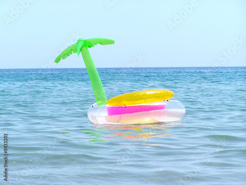 Inflatable palm tree in the water