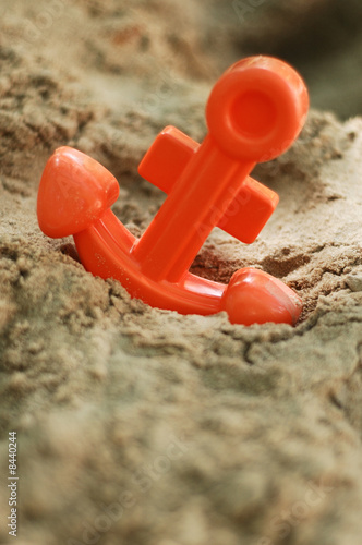 toy anchor in sand