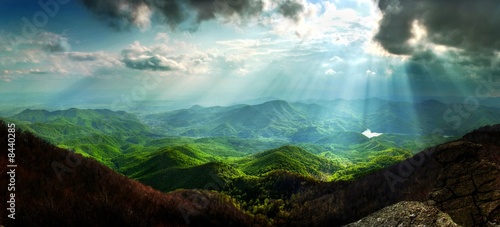 Sun rays mountain landscape photo