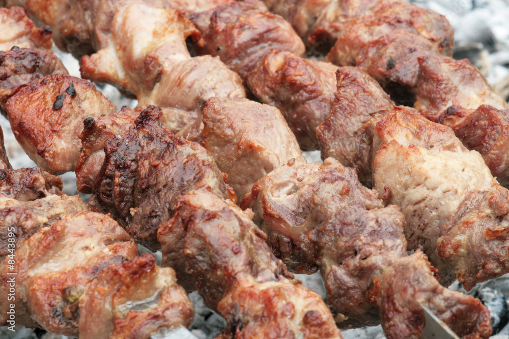 Barbecue grill meat in cooking process.