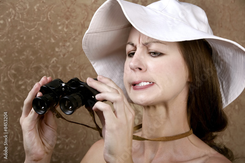 Woman with Sunglasses and Binoculars photo