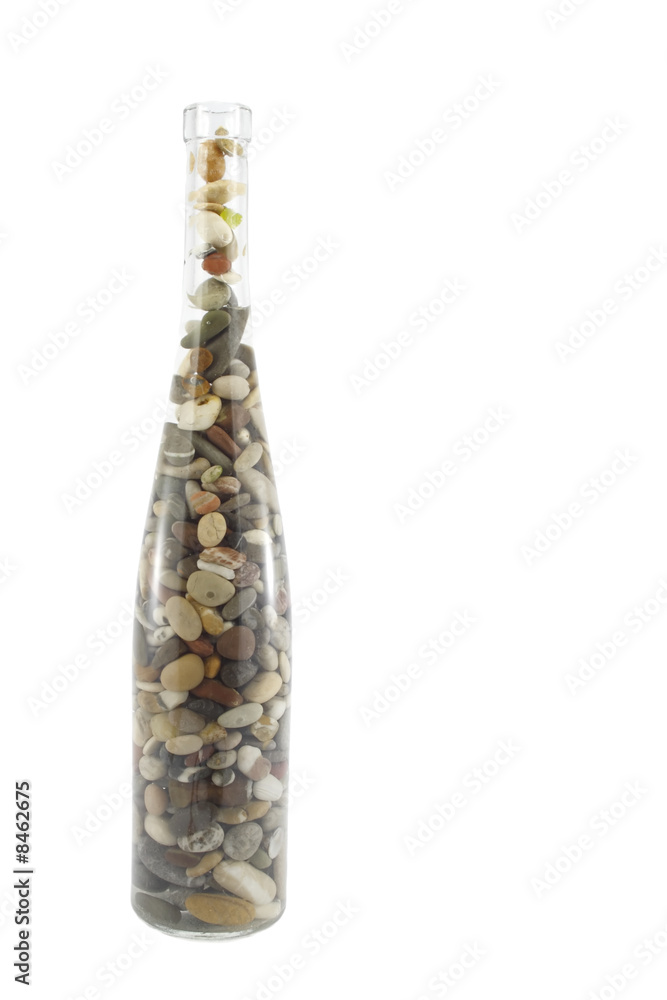 Stones in bottle isolated on white Stones in bottle isolated on white