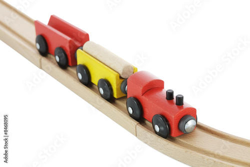 Wooden toy train on rail