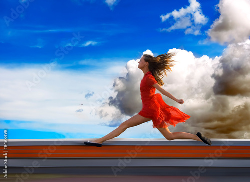 Running on the roof of a young woman