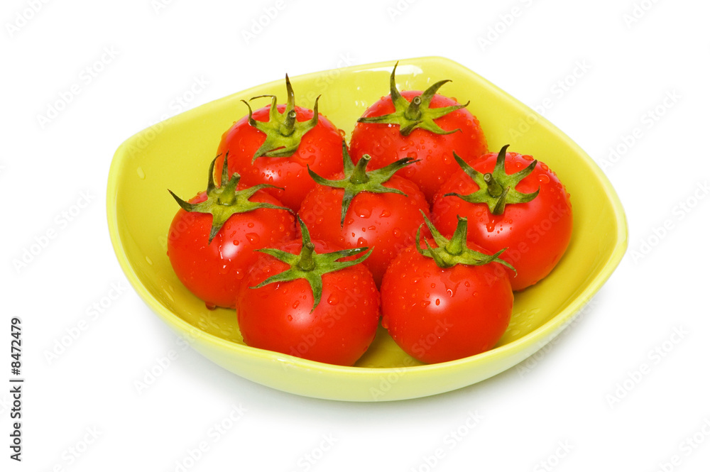 Wet whole tomatos isolated on white background Wet whole tomatos isolated on white background