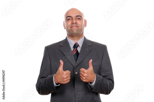 Happy businessman showing thumbs up