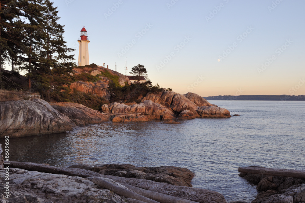 point atkinson lighthouse at sunset and moonrise