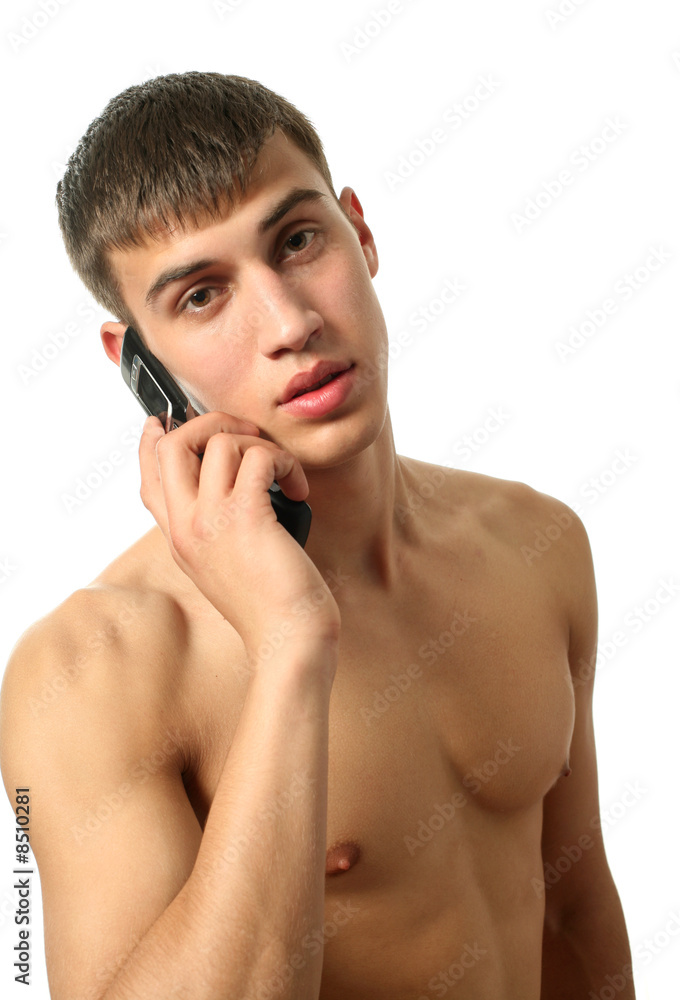 Fototapeta premium Muscular Man Calling on the Cell Phone