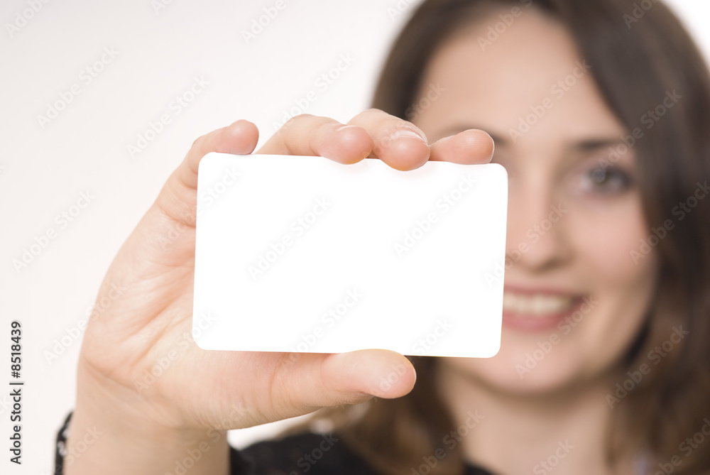 Beautiful woman holding empty gray board Beautiful woman holding empty gray board