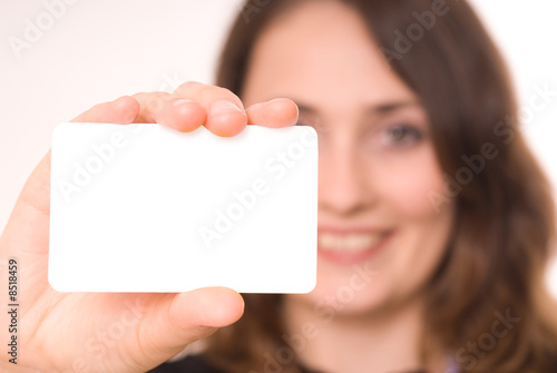 Beautiful woman holding empty white board