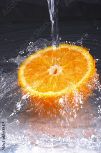 Fresh orange   water splash