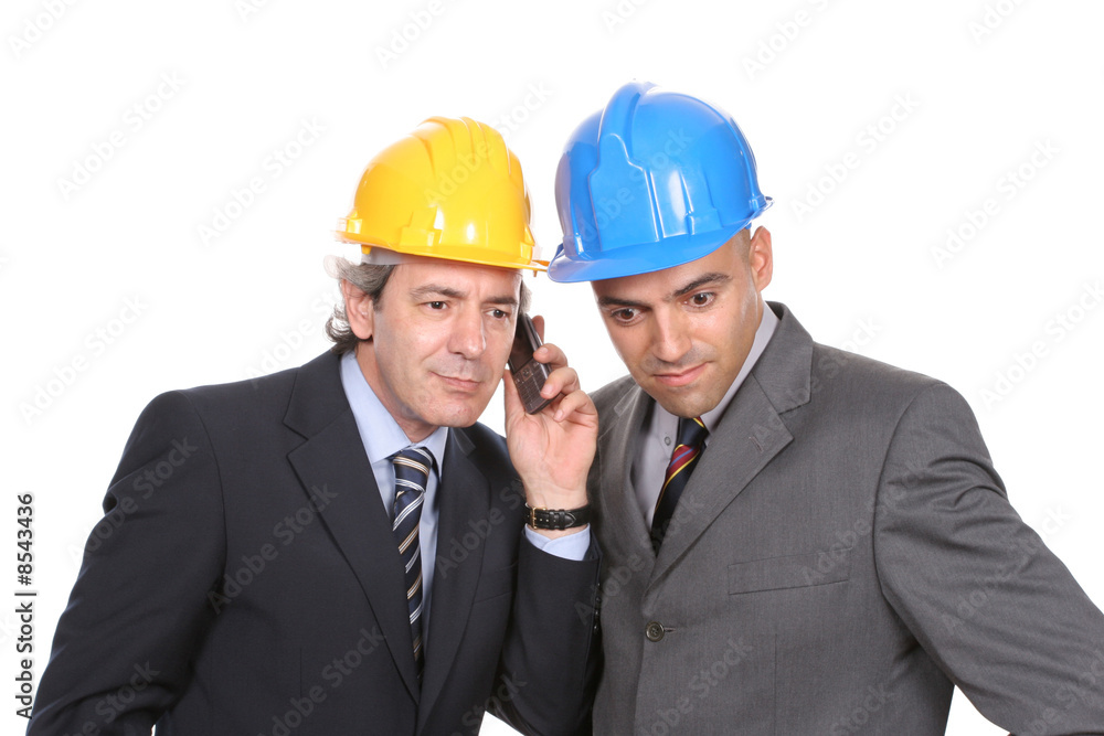 Two Engineers or Architects, on the phone Two Engineers or Architects, on the phone