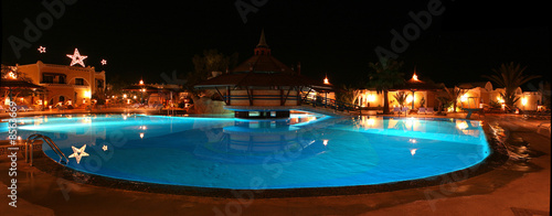 Luxury swimming pool at night