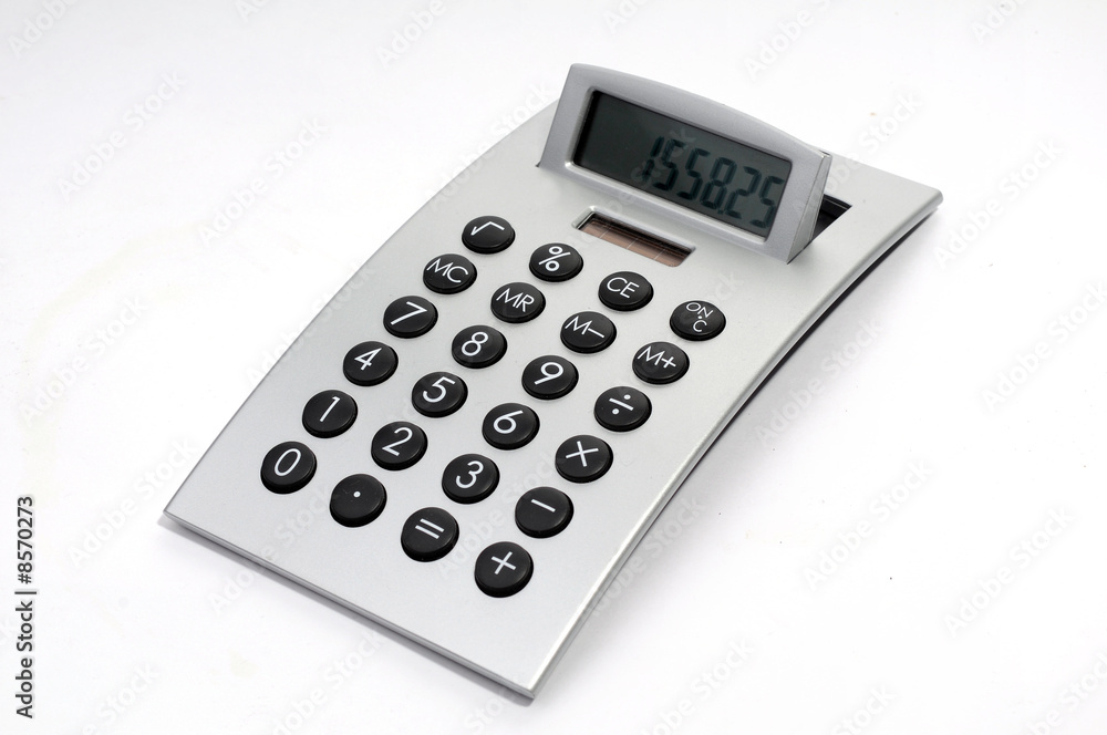An electronic calculator on white An electronic calculator on white