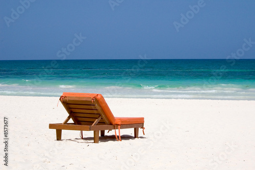 beachchair facing the sea © Pugstudio