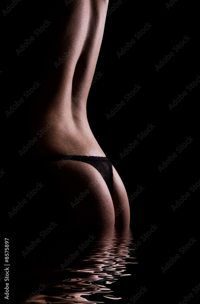 Foto Stock classic low key photo of sexy woman body | Adobe Stock