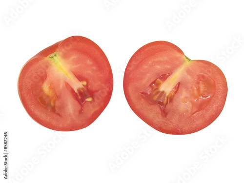 Isolated slashed tomato against the white background