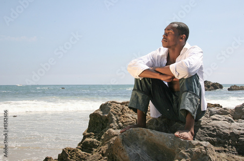 Handsome African American Man on the Beach Thinking © Katrina Brown