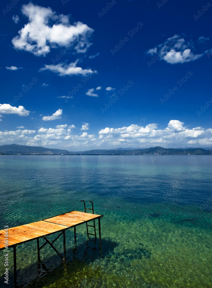 Wooden pier jutts out into Ohrid Lake