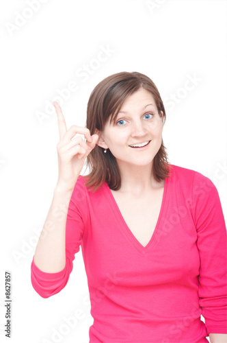 smiling woman pointing up