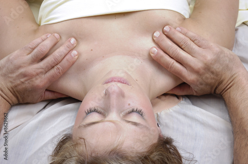 Woman having deep tisue shoulder massage
